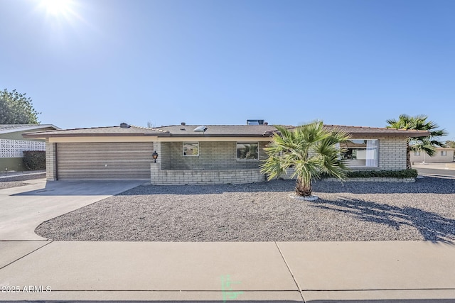 ranch-style home with a garage