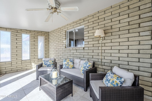 view of patio with an outdoor living space and ceiling fan