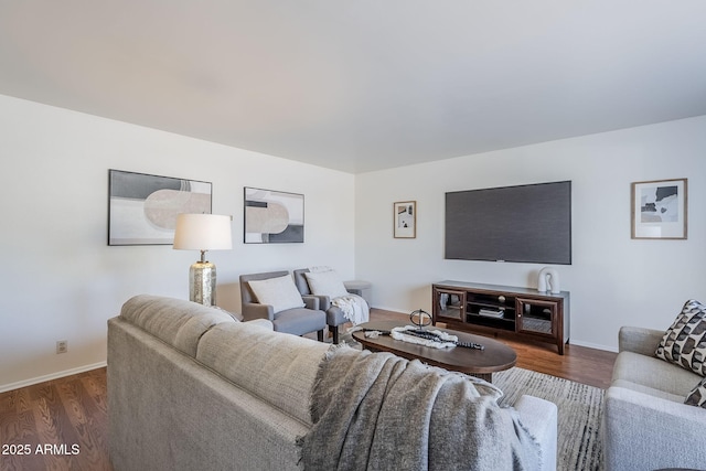 living room with dark hardwood / wood-style flooring