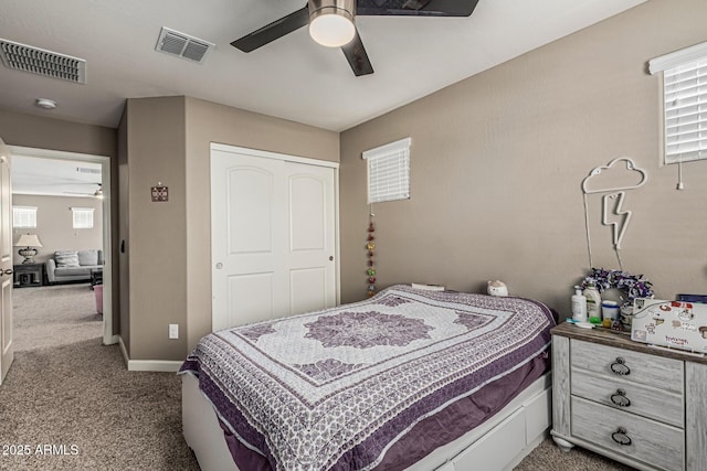 1723 N Hillcrest, Mesa, AZ 85201 - carpeted bedroom with multiple windows, a closet, and ceiling fan