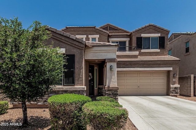 1723 N Hillcrest, Mesa, AZ 85201 - view of front of property with an attached garage, a balcony, driveway, stucco siding, and a tile roof