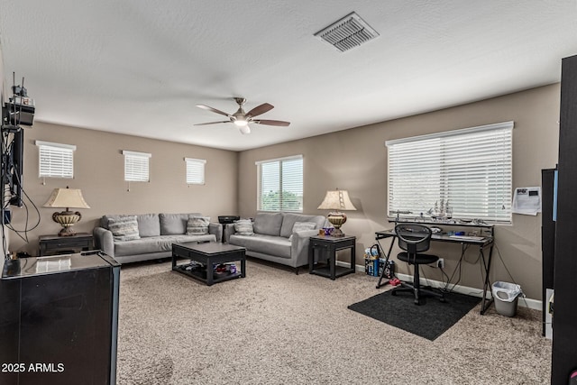 1723 N Hillcrest, Mesa, AZ 85201 - carpeted living room featuring a ceiling fan and baseboards