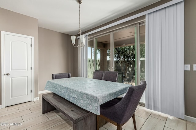 1723 N Hillcrest, Mesa, AZ 85201 - dining area with a chandelier and wood tiled floors