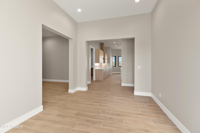 corridor featuring light wood-type flooring