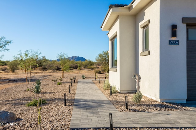 view of home's exterior featuring a mountain view