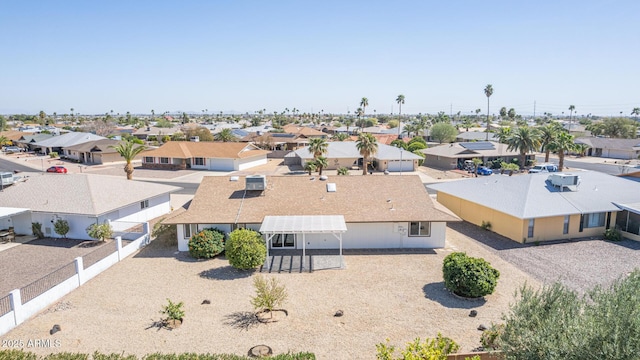 birds eye view of property with a residential view