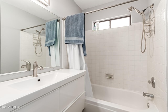 bathroom with vanity and shower / bath combo