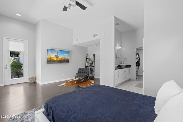 3402 E Sells Dr, Phoenix, AZ 85018 - bedroom with light wood-style flooring, baseboards, a ceiling fan, a high ceiling, and recessed lighting