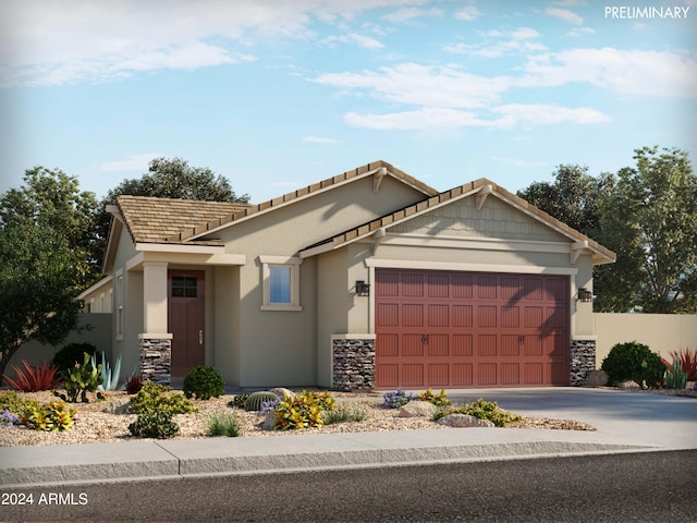 view of front of property with a garage