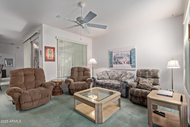 carpeted living room featuring ceiling fan