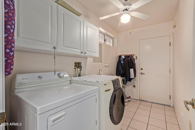 laundry area with separate washer and dryer, cabinets, ceiling fan, and light tile patterned flooring