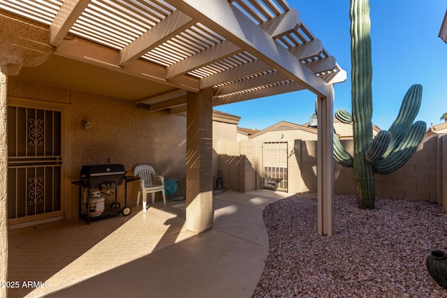 view of patio / terrace featuring a pergola and grilling area