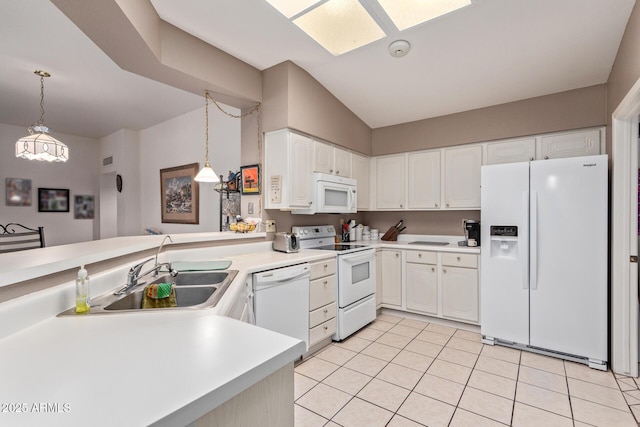 kitchen featuring sink, white cabinets, white appliances, and decorative light fixtures