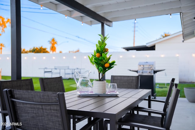 view of patio featuring outdoor dining area