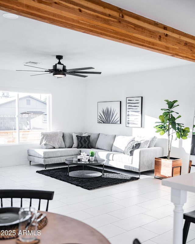 living room with a ceiling fan