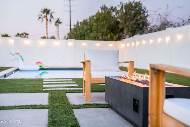 view of yard with a fire pit