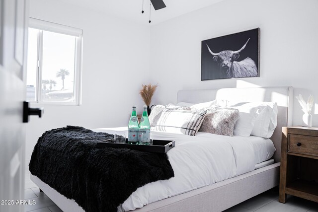 bedroom with tile patterned floors