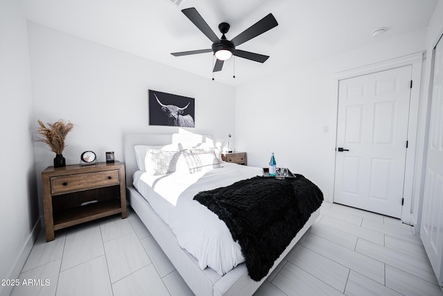 bedroom featuring ceiling fan