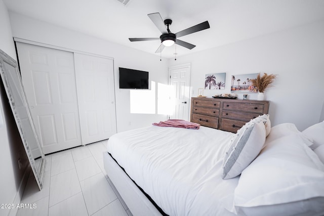 bedroom with a closet and a ceiling fan