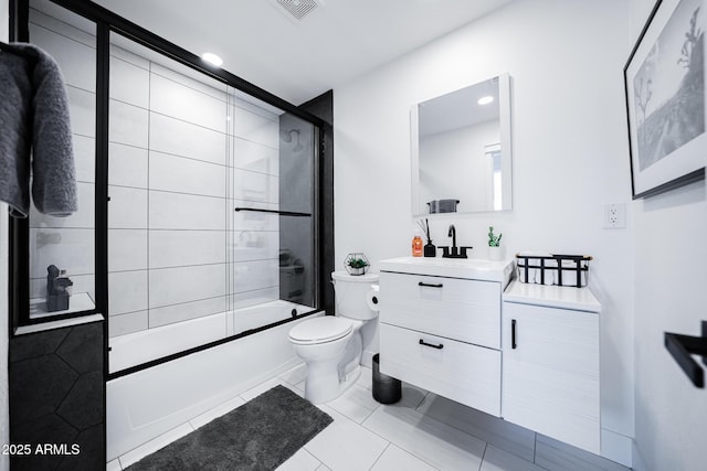 full bathroom featuring toilet, shower / bath combination with glass door, vanity, recessed lighting, and tile patterned floors
