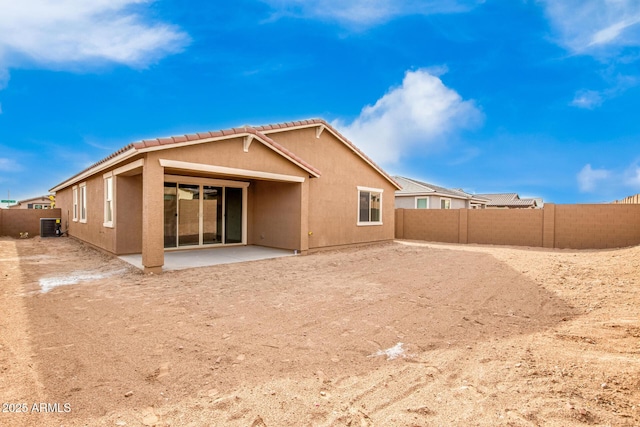 rear view of property featuring a patio