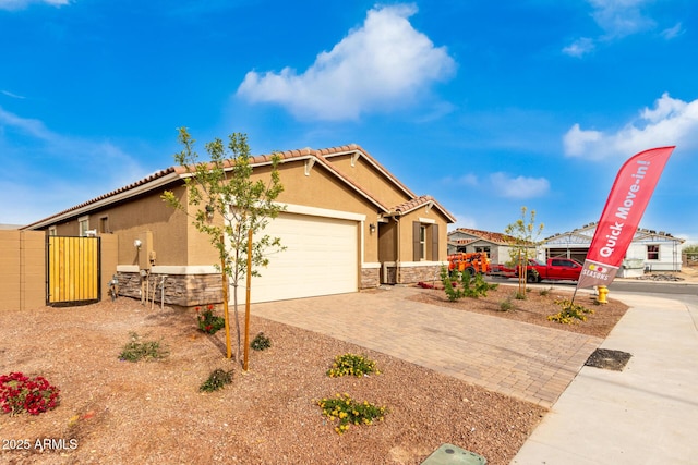 view of front of property with a garage