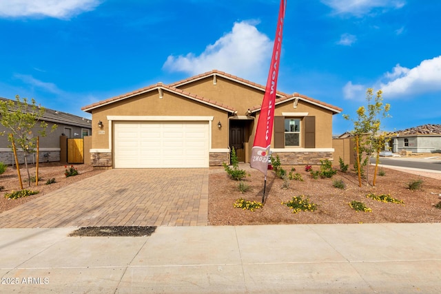 view of front of home with a garage