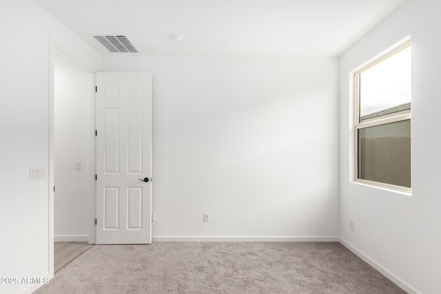 view of carpeted spare room