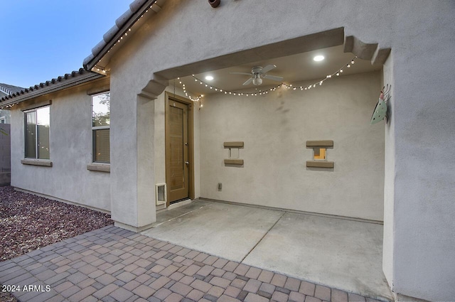 view of patio / terrace featuring ceiling fan