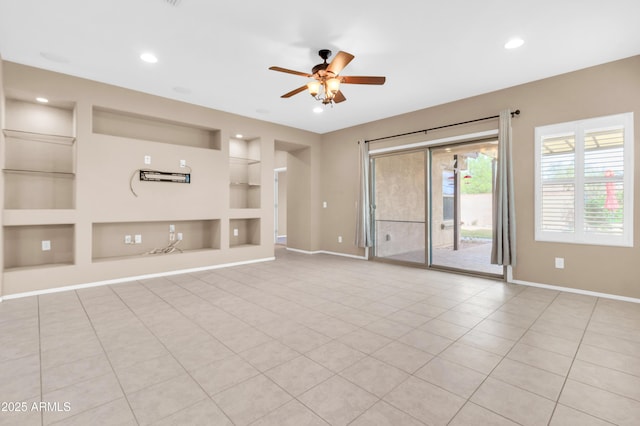 unfurnished living room featuring built in shelves, baseboards, a ceiling fan, and recessed lighting