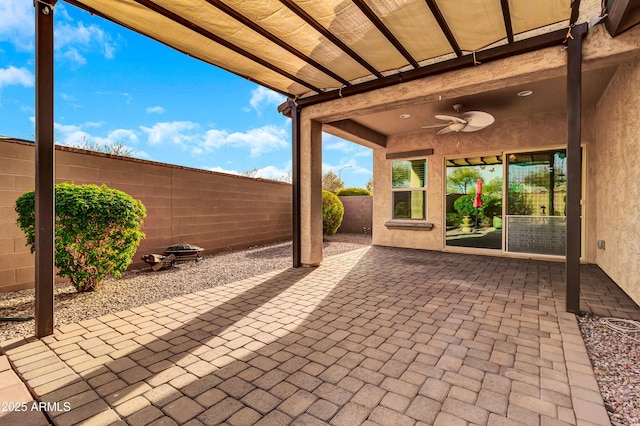 view of patio / terrace featuring a fenced backyard and ceiling fan