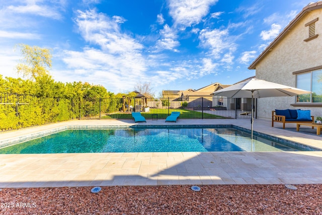 view of swimming pool with a patio area, fence, an outdoor hangout area, and a fenced in pool