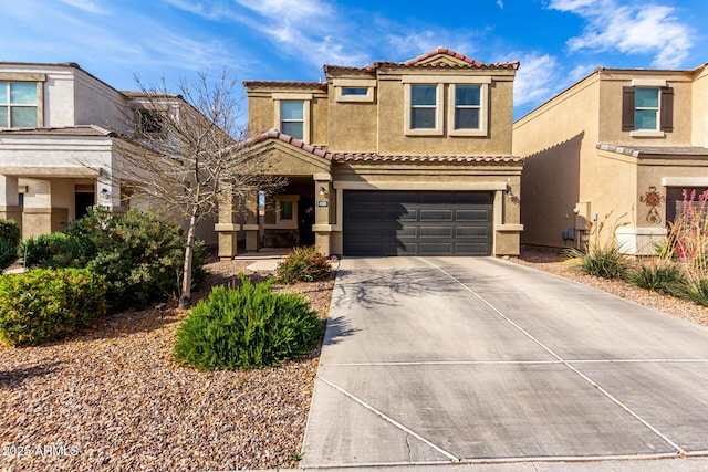 view of front of house with a tiled roof, a garage, driveway, and stucco siding
