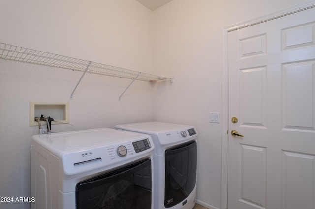 laundry area with washer and dryer and hookup for a washing machine