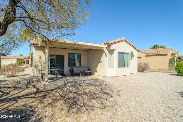 back of house featuring a patio