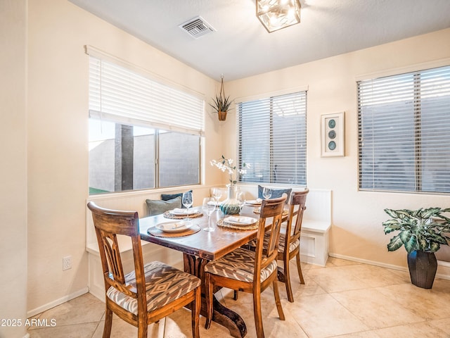 view of tiled dining space