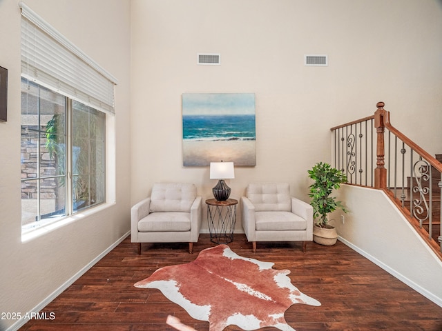 living area featuring dark wood-type flooring