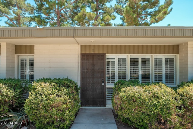7740 E Heatherbrae Ave Unit 3, Scottsdale, AZ 85251 - view of exterior entry with concrete block siding