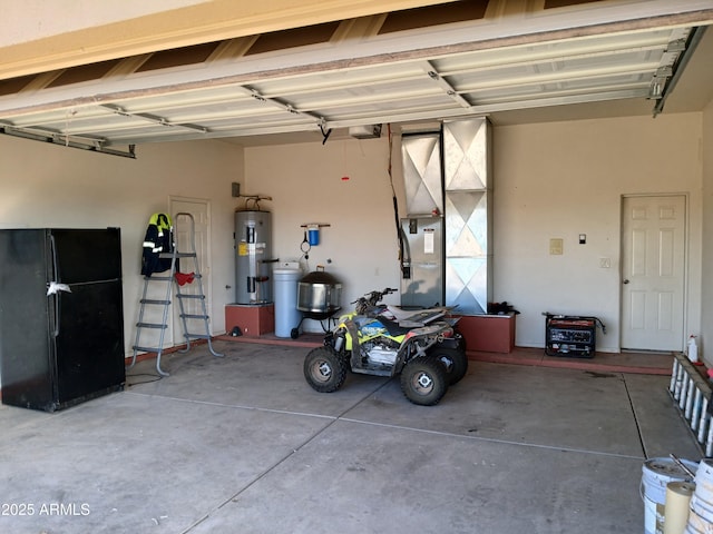 garage featuring black fridge, a garage door opener, and electric water heater