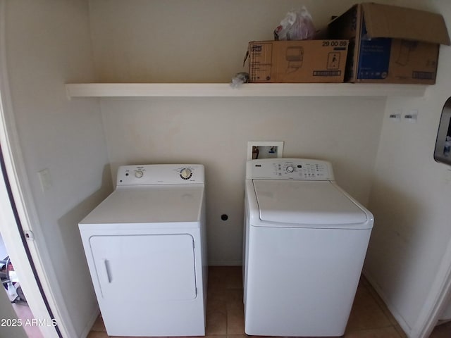 laundry area with washing machine and dryer