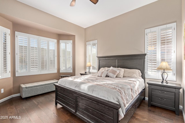 bedroom featuring dark hardwood / wood-style flooring and ceiling fan