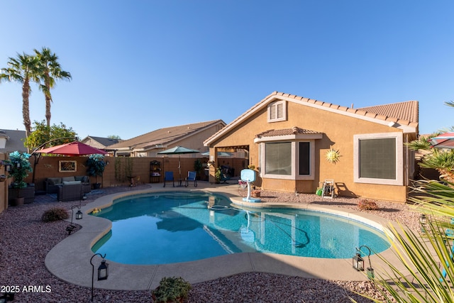 view of swimming pool with a patio