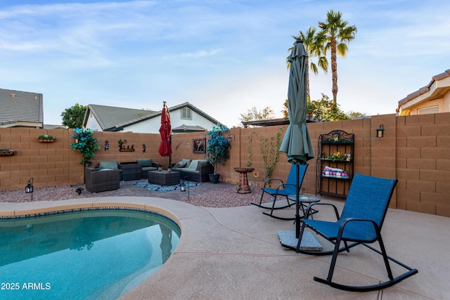 view of swimming pool with outdoor lounge area and a patio area