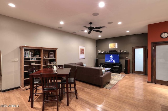 dining area featuring light hardwood / wood-style floors and ceiling fan