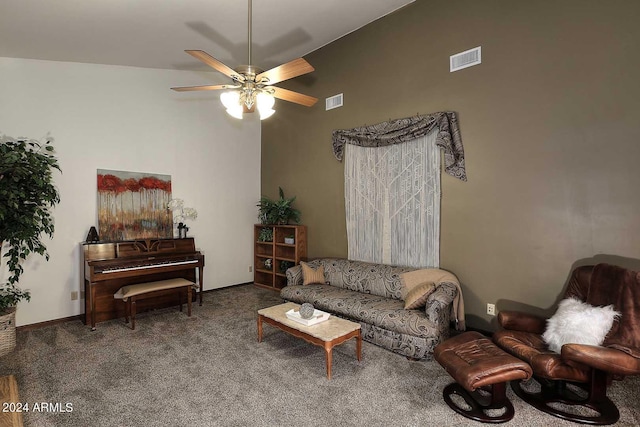 living room with ceiling fan, dark carpet, and lofted ceiling