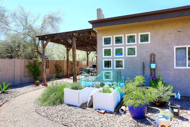 exterior space with a pergola