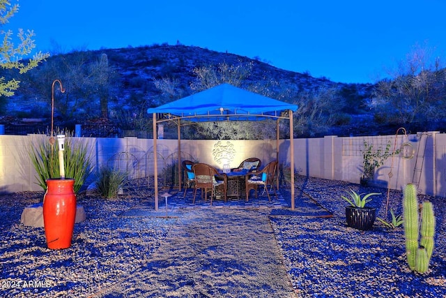 view of patio featuring a mountain view