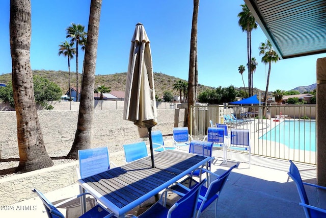 view of patio featuring a community pool