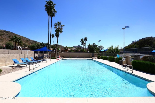 view of pool featuring a patio