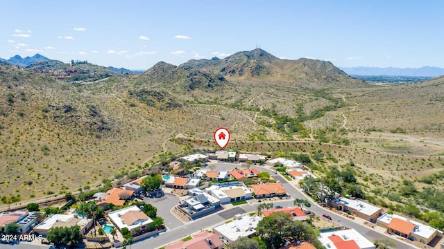 drone / aerial view featuring a mountain view